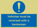 vehicles-must-be-reversed-with-a-banksman~